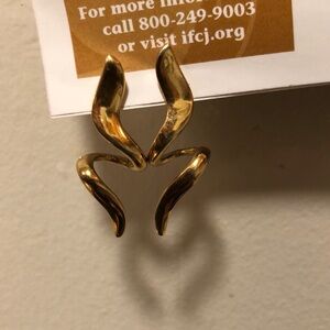 A pair of drop earrings that make any outfit a little more “ stylish”